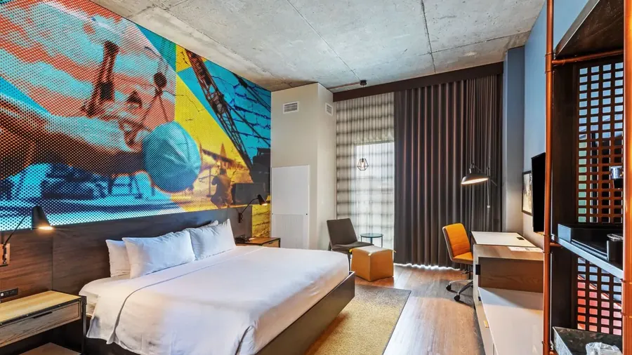 Hotel Indigo guestroom with custom artwork wall mural