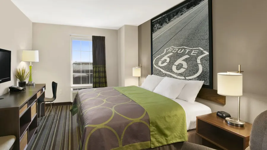 Super 8 guestroom renovation with custom Route 66 wall mural and casegoods